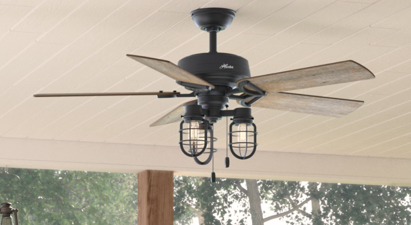 Outdoor fan affixed to patio ceiling and used for airflow on hot days