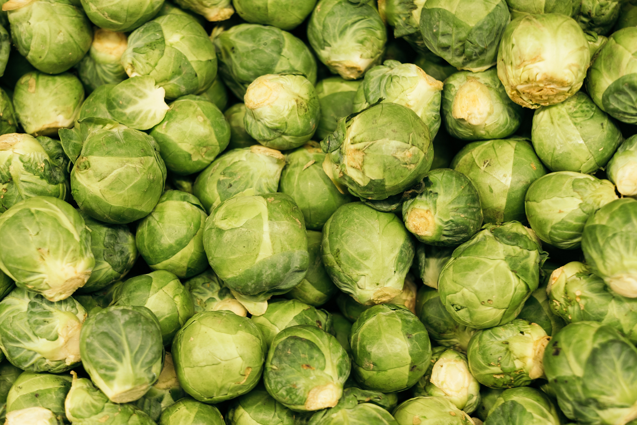 Image of a large pile of Brussels sprouts.